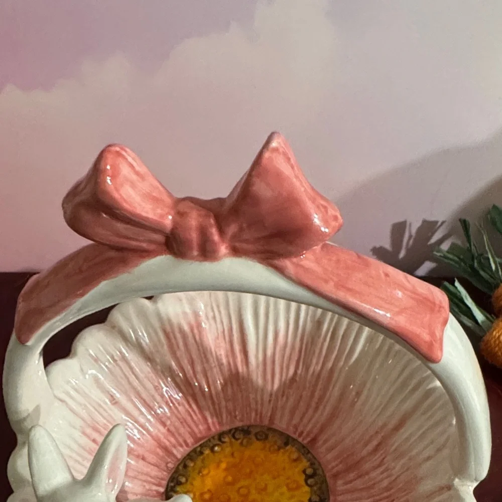 Vintage Ceramic bunny basket with a pink bow and floral motif